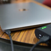 How do I charge my laptop with my phone?