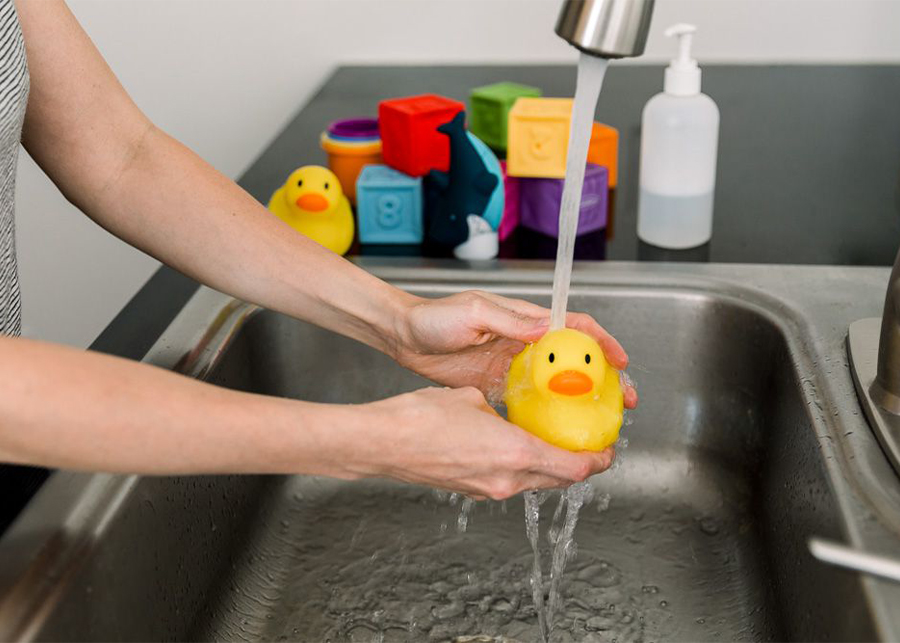 Can I wash bath toys in the washing machine?